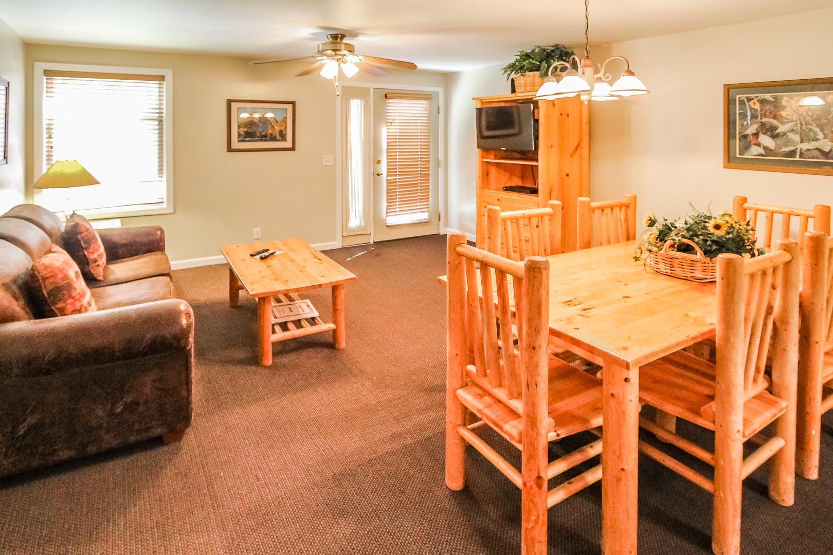 A cozy dining and living room at VRI's Jackson Pines in Wyoming.